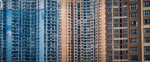 high rise architectural photography of city buildings town